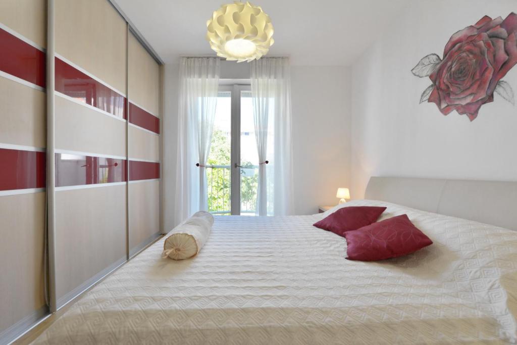 Posteľ alebo postele v izbe v ubytovaní Cozy beach apartment Split