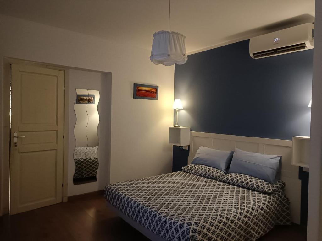 Postel nebo postele na pokoji v ubytování B&B SAN FRANCESCO Pescara Centro