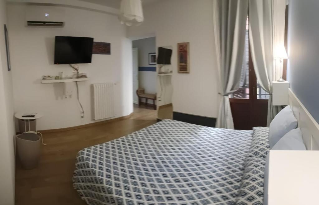 Postel nebo postele na pokoji v ubytování B&B SAN FRANCESCO Pescara Centro