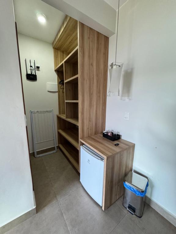 Kuchyň nebo kuchyňský kout v ubytování Suítes Conforto no Paraíso
