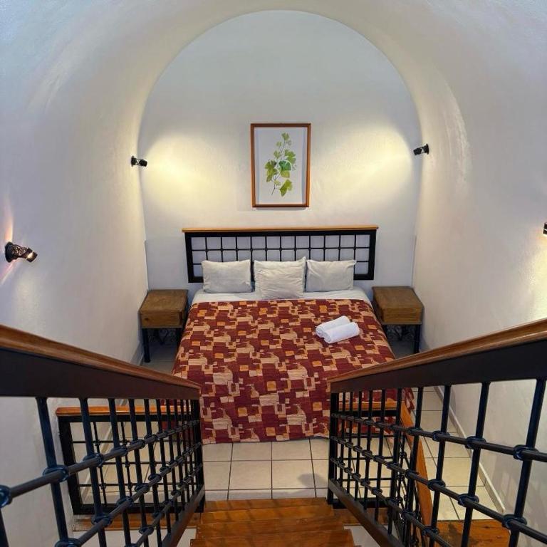 Postel nebo postele na pokoji v ubytování Hotel Meson de Carolina
