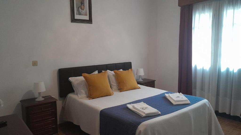 Postel nebo postele na pokoji v ubytování Serrana Gerês Inn