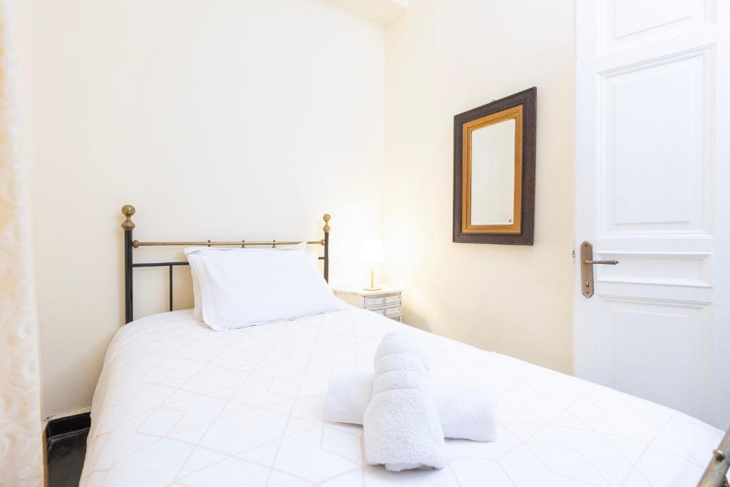 Posteľ alebo postele v izbe v ubytovaní Angiolina Sea View Apartment