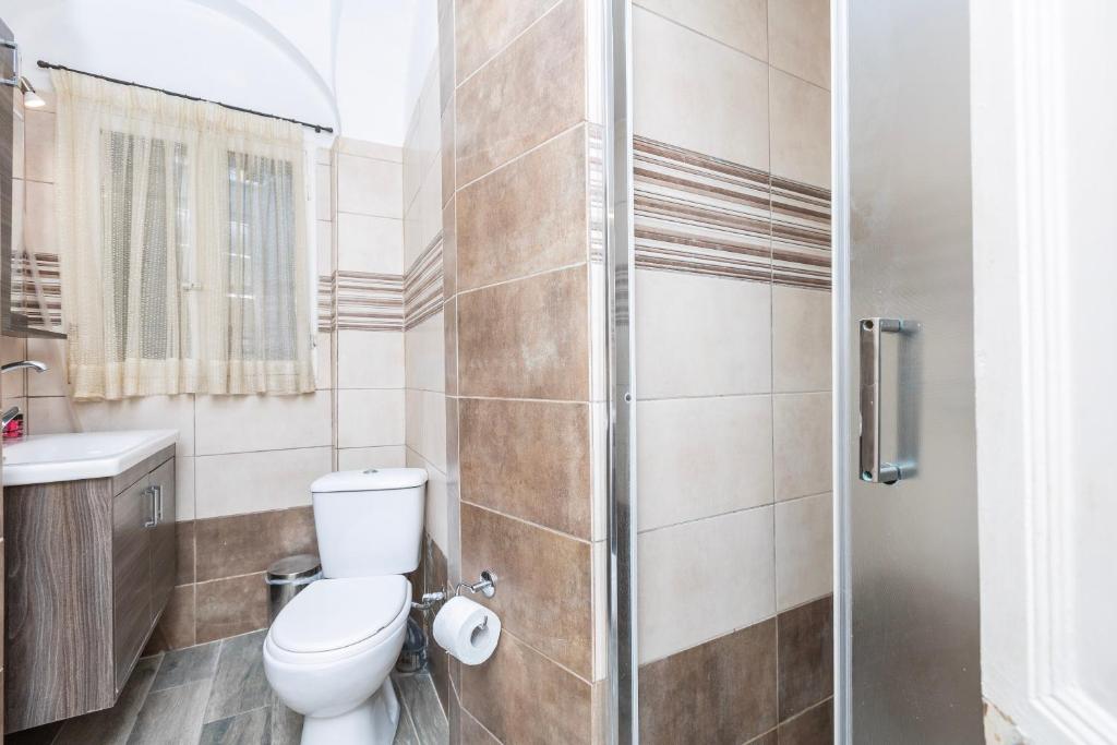 Kúpeľňa v ubytovaní Angiolina Sea View Apartment