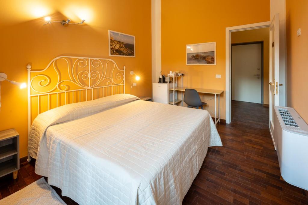 Postel nebo postele na pokoji v ubytování Lecce Eco Suites