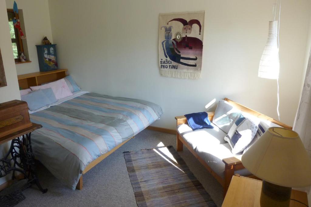 Postel nebo postele na pokoji v ubytování B&B Pinorama