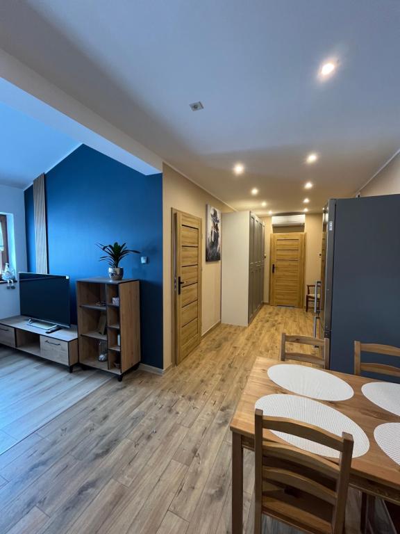 Kuchyň nebo kuchyňský kout v ubytování Luksusowy przestronny apartament