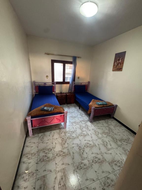 Cama o camas de una habitación en Apartamento alquiler vacacional con vista a mar