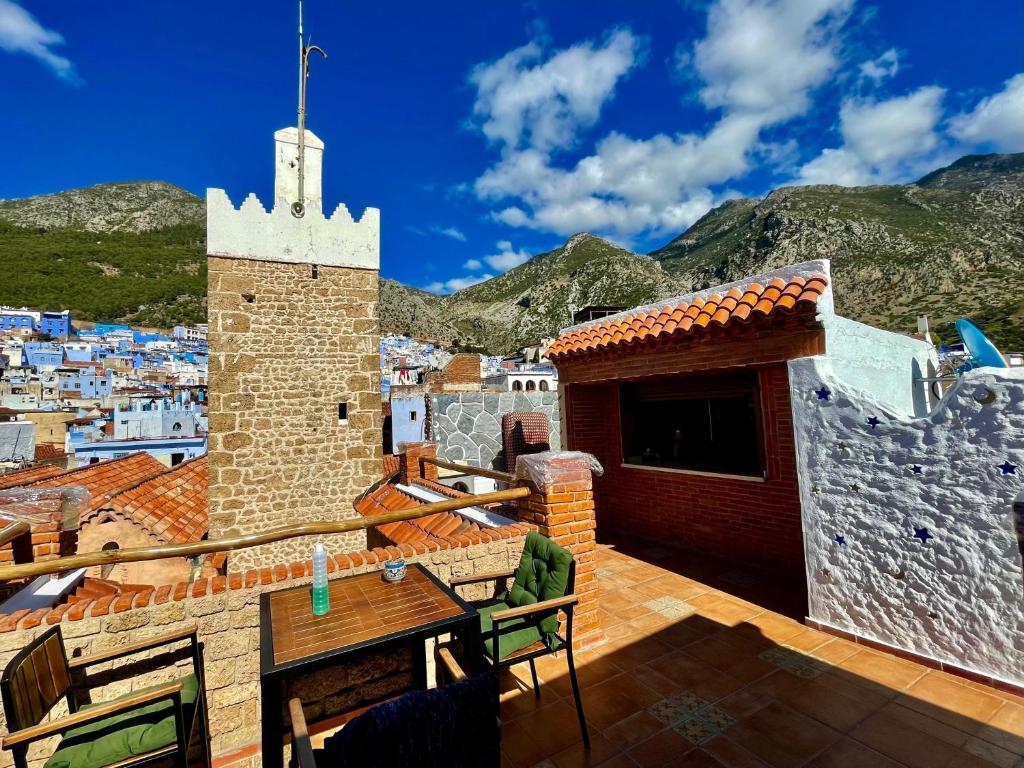 a view from the roof of a house at Riad abi khancha in Chefchaouen