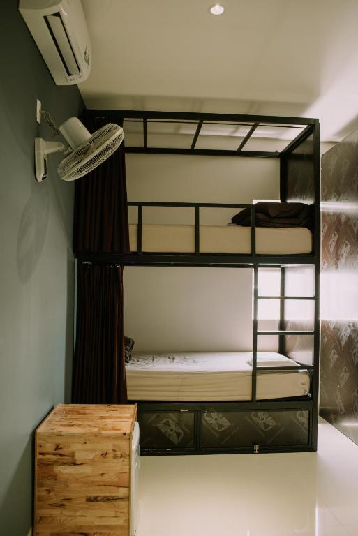 Postel nebo postele na pokoji v ubytování Talofofo Hostel