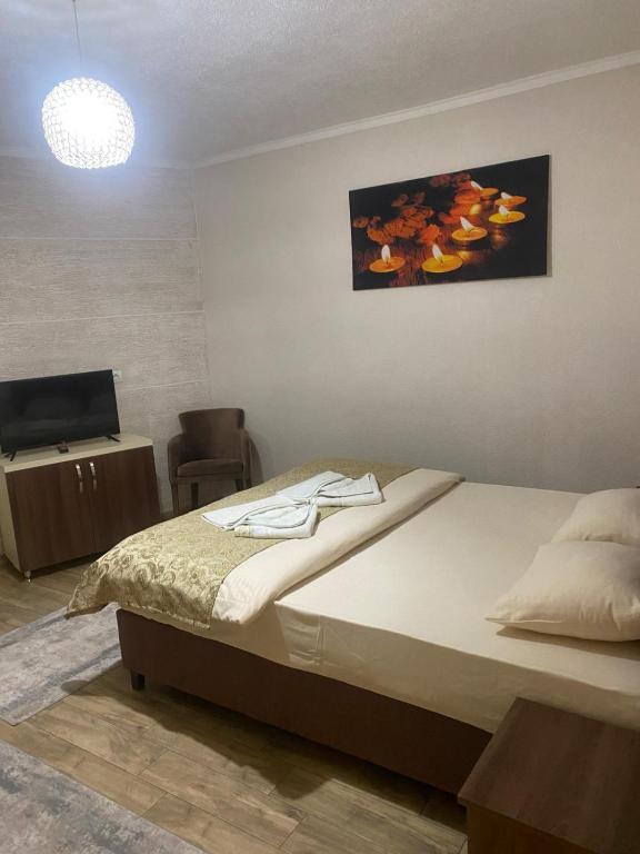 Ένα ή περισσότερα κρεβάτια σε δωμάτιο στο My Place