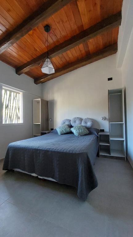 Voodi või voodid majutusasutuse Ribera de Cacheuta Lodge toas