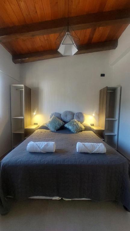 Voodi või voodid majutusasutuse Ribera de Cacheuta Lodge toas