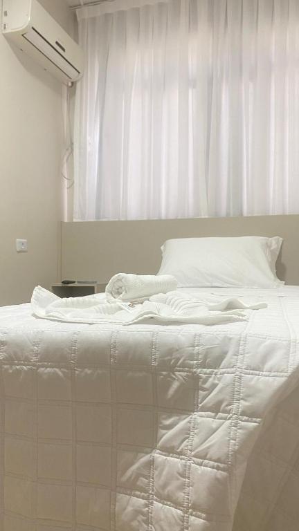 Postel nebo postele na pokoji v ubytování Hotel Marechal Express