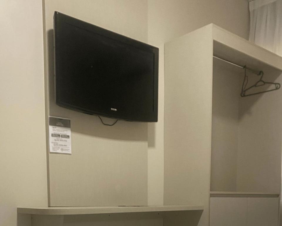 TV a/nebo společenská místnost v ubytování Hotel Marechal Express