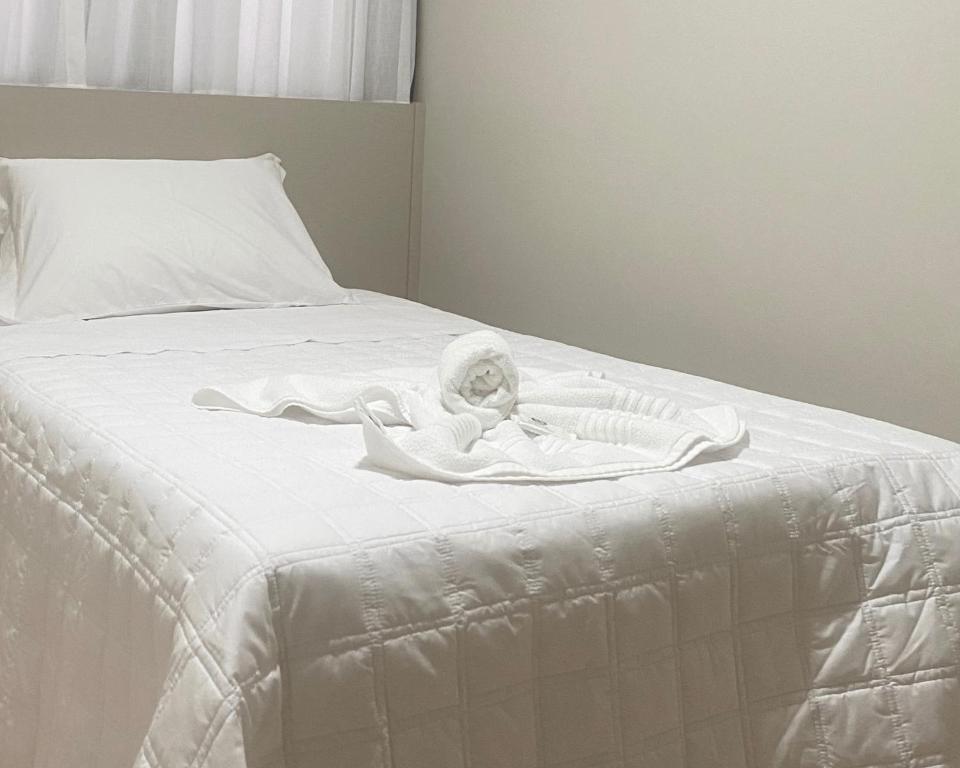 Postel nebo postele na pokoji v ubytování Hotel Marechal Express