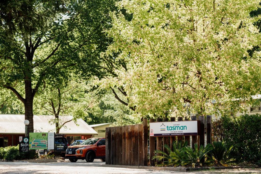 a sign for a museum in a parking lot at Tasman Holiday Parks - South Bright in Bright