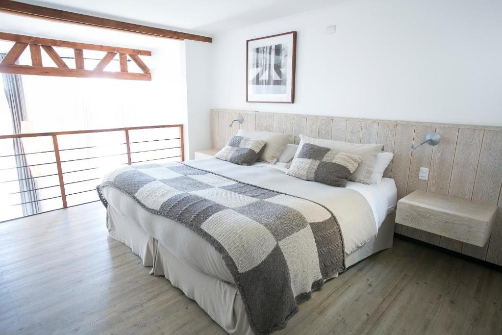 Postel nebo postele na pokoji v ubytování Casa Galos Hotel & Lofts