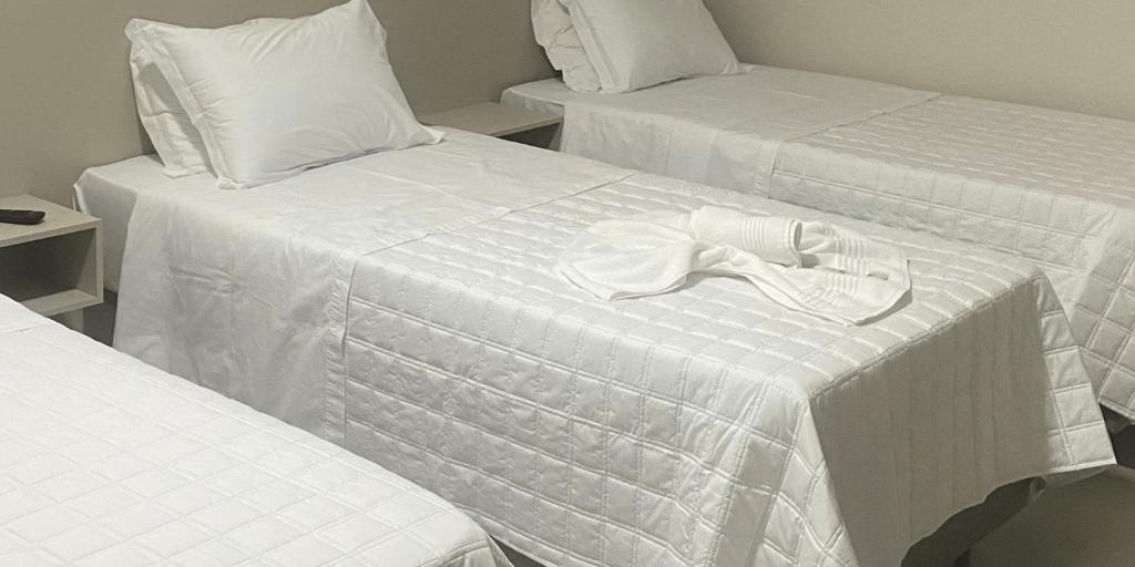 Postel nebo postele na pokoji v ubytování Hotel Marechal Express