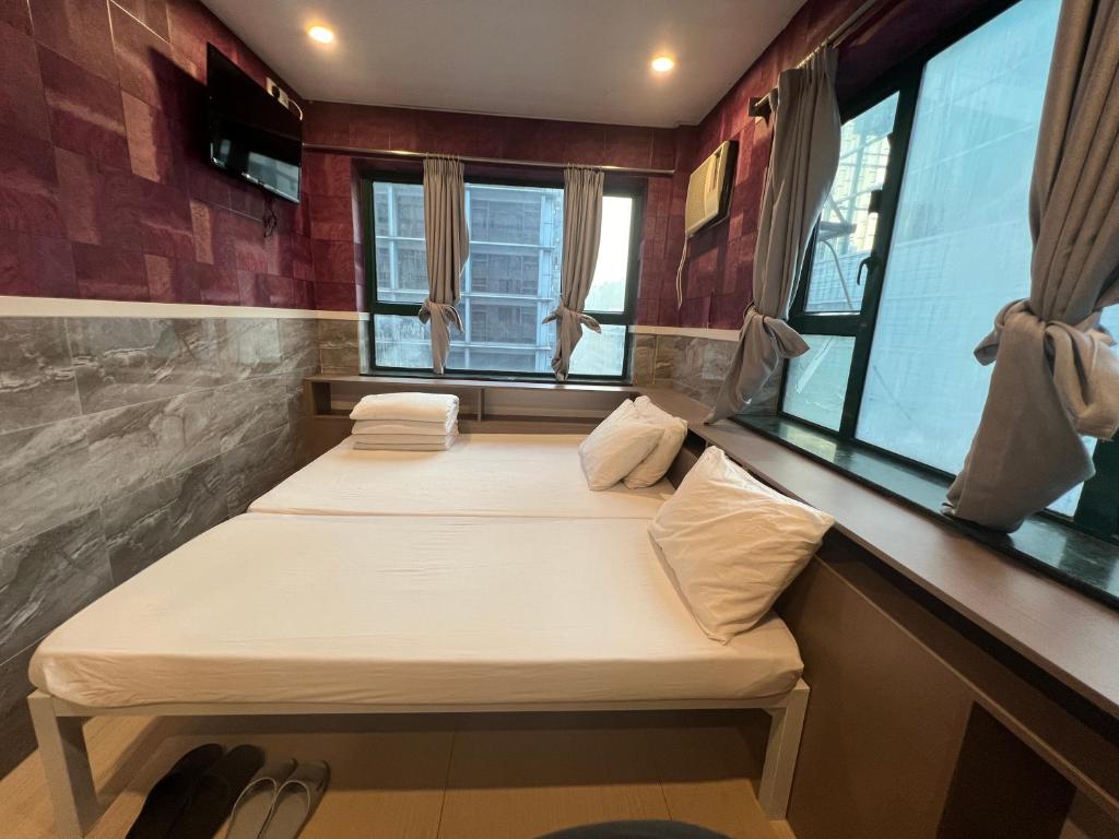 Postel nebo postele na pokoji v ubytování Venetian Hostel