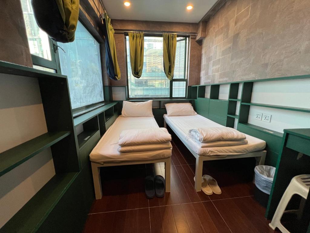 Postel nebo postele na pokoji v ubytování Venetian Hostel