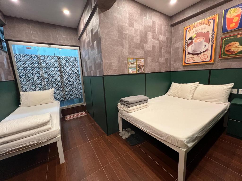 Postel nebo postele na pokoji v ubytování Venetian Hostel