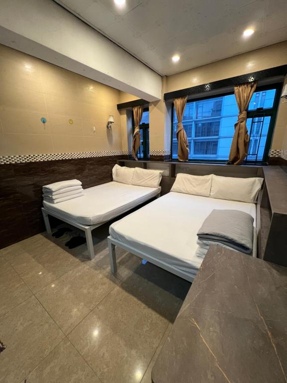 Postel nebo postele na pokoji v ubytování Venetian Hostel