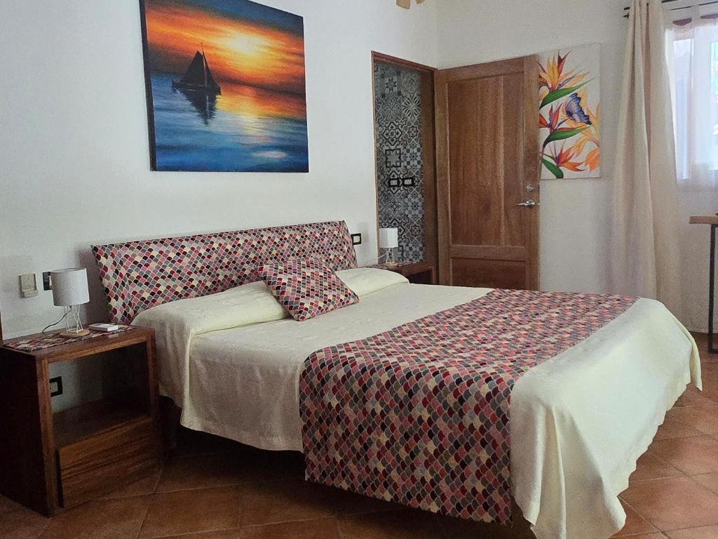 Postel nebo postele na pokoji v ubytování Villas Kalimba