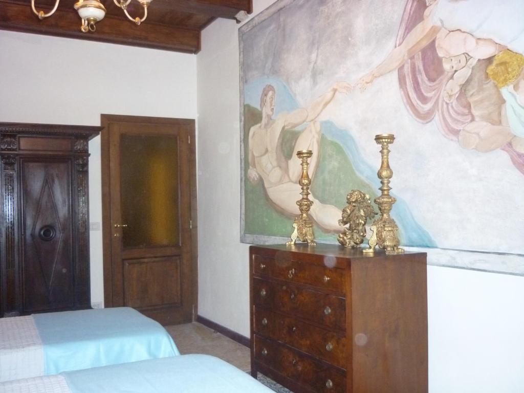 Łóżko lub łóżka w pokoju w obiekcie San Zanobi Apartment
