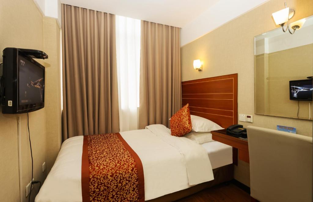 TV a/nebo společenská místnost v ubytování Shanghai YUHANG Hotel