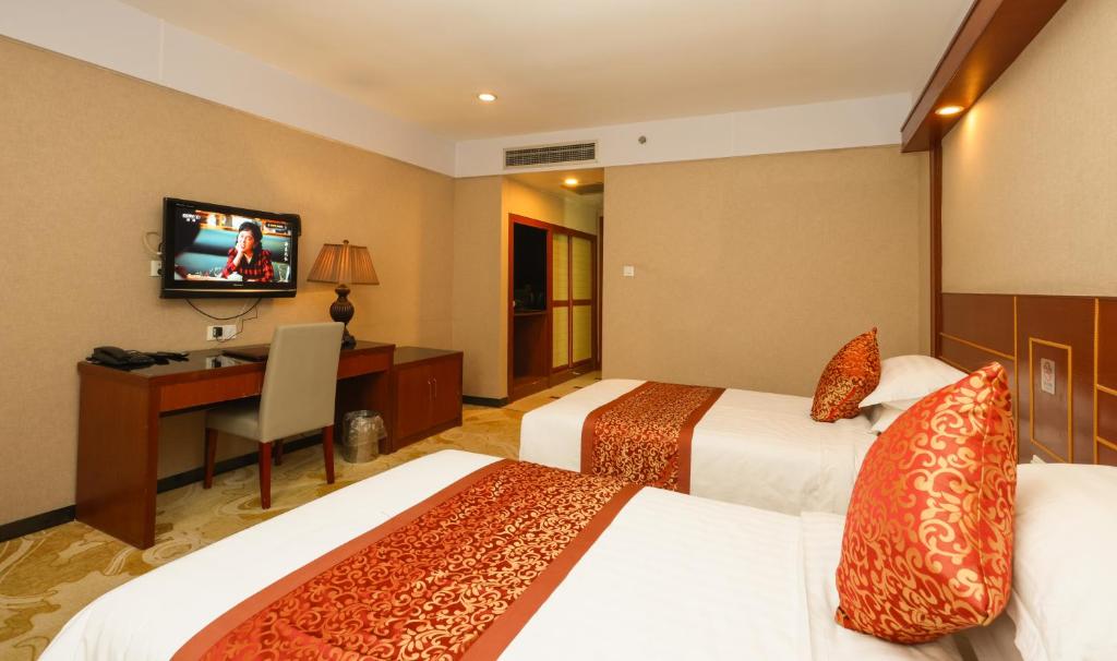 TV a/nebo společenská místnost v ubytování Shanghai YUHANG Hotel