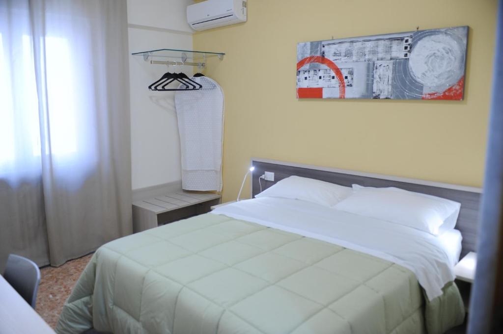 Postel nebo postele na pokoji v ubytování Dimore Le Lucane