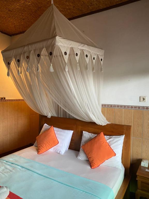 Postel nebo postele na pokoji v ubytování Sulendra Jungle Suites Ubud View by EPS