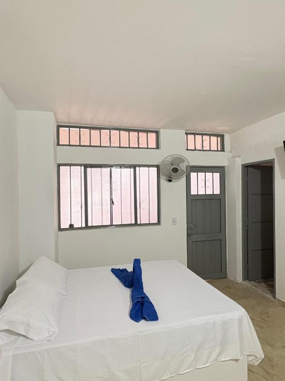 Postel nebo postele na pokoji v ubytování Hotel Dauphin Rest