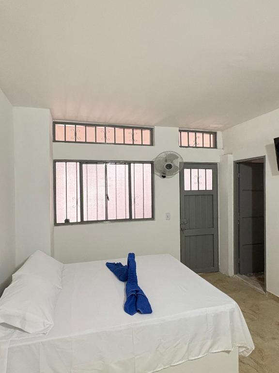 Postel nebo postele na pokoji v ubytování Hotel Dauphin Rest