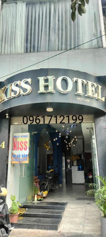 a store front of aiss houston with a sign on it at HOTEL KIS 14 Xã Đàn in Hanoi