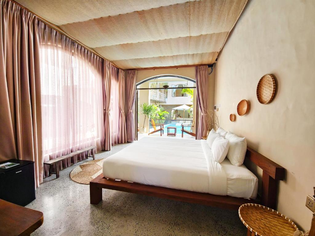 Giường trong phòng chung tại Red Sands Mui Ne