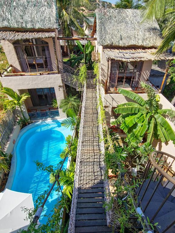 an aerial view of a resort with a swimming pool at Red Sands Mui Ne in Mui Ne