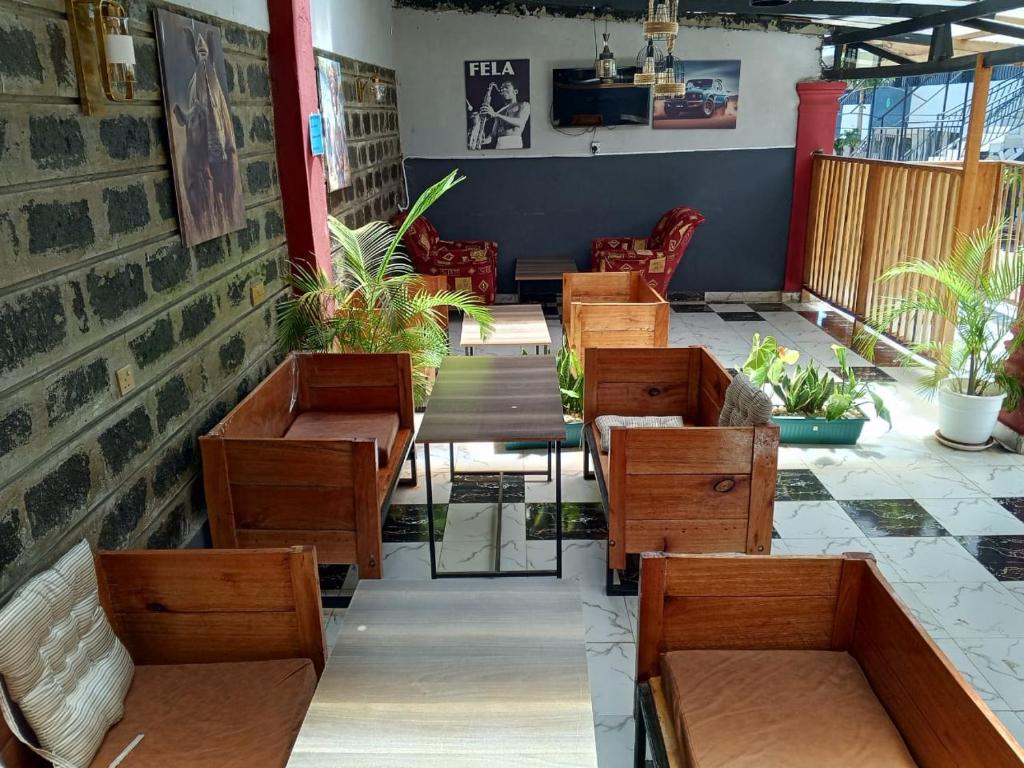 Posezení v ubytování RosaBlu Hotel Kutus