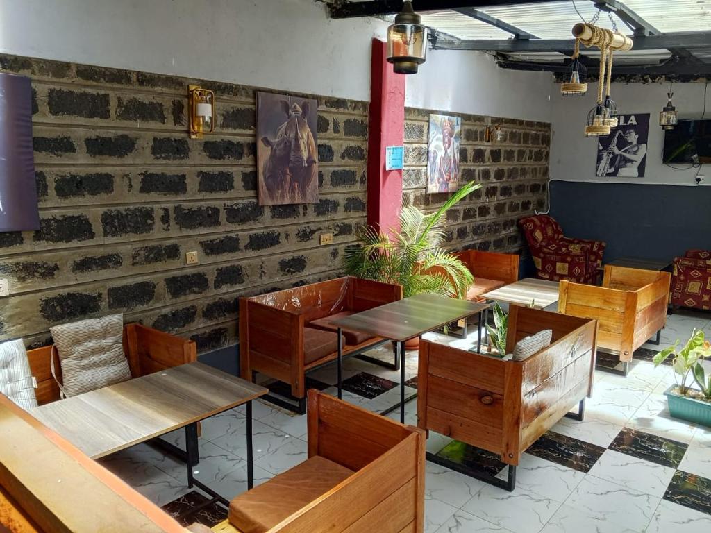 Posezení v ubytování RosaBlu Hotel Kutus