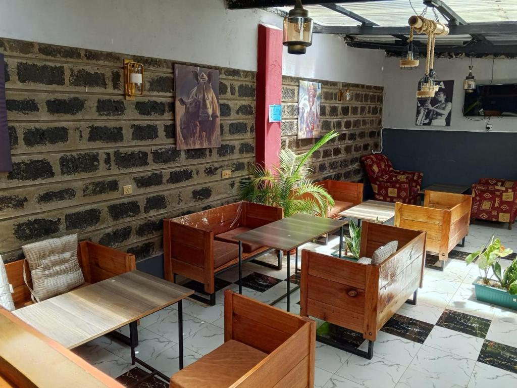 Posezení v ubytování RosaBlu Hotel Kutus