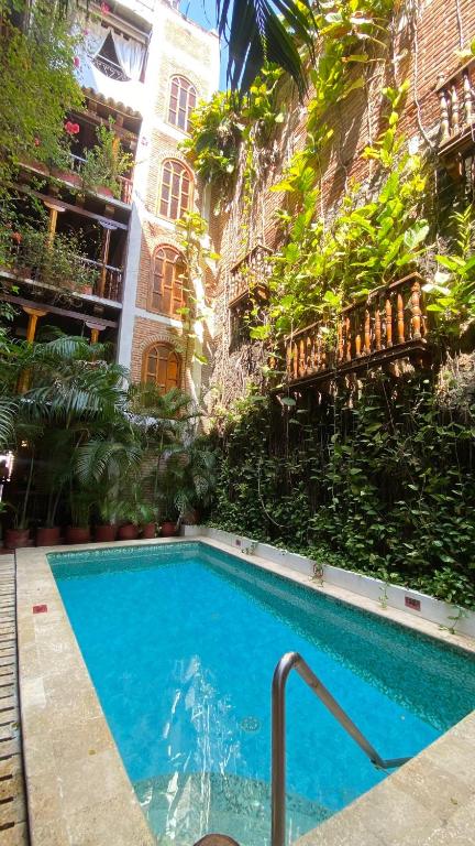 Bazén v ubytování Hotel Don Pedro De Heredia nebo v jeho okolí