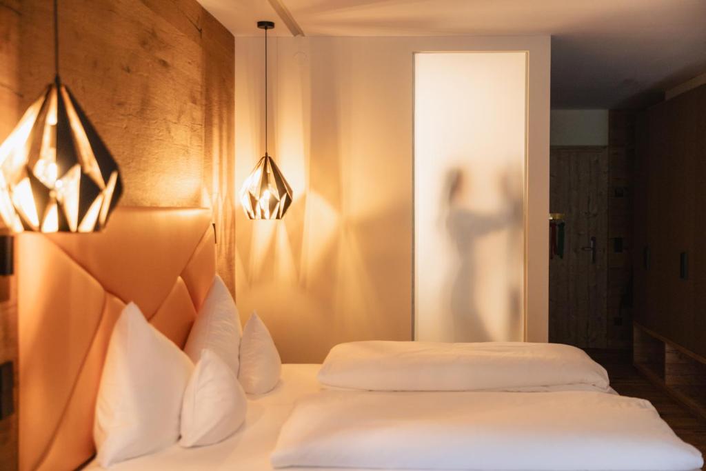 Postel nebo postele na pokoji v ubytování Hotel Die Post