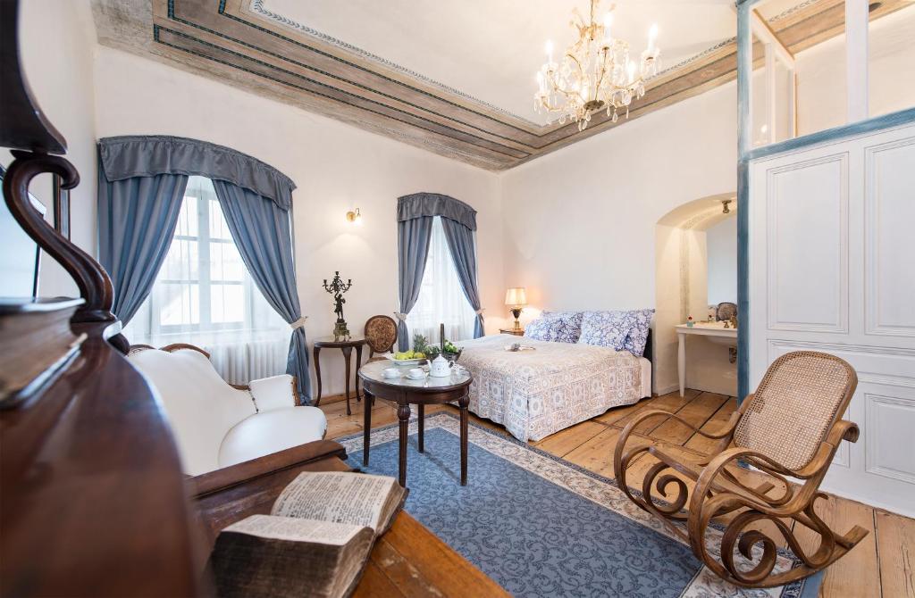 Postel nebo postele na pokoji v ubytování Chateau GrandCastle