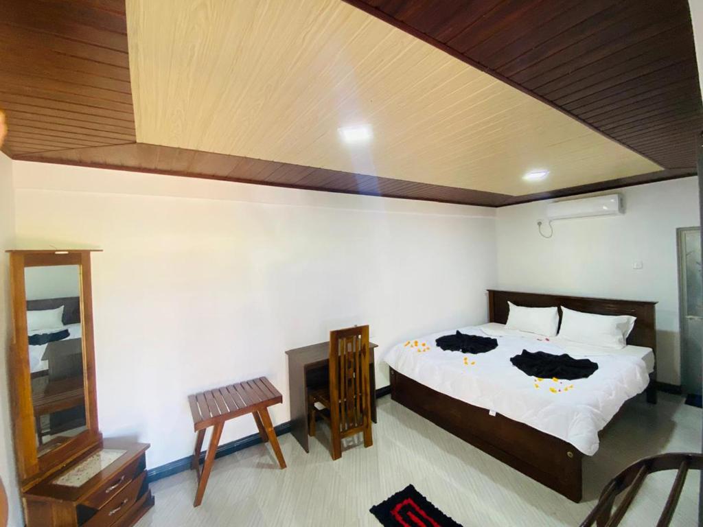 Postel nebo postele na pokoji v ubytování Sunset view Homestay Sigiriya