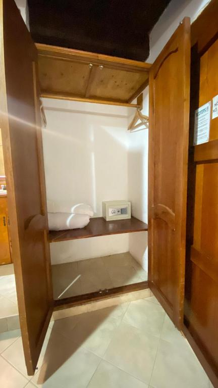Postel nebo postele na pokoji v ubytování Hotel Don Pedro De Heredia