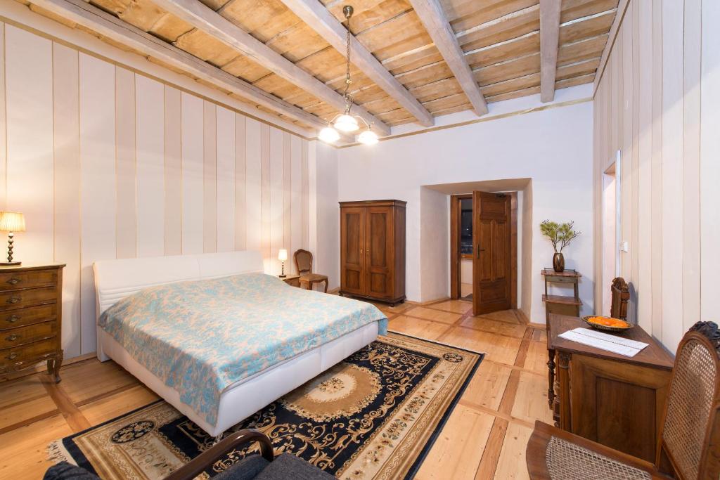 Postel nebo postele na pokoji v ubytování Chateau GrandCastle