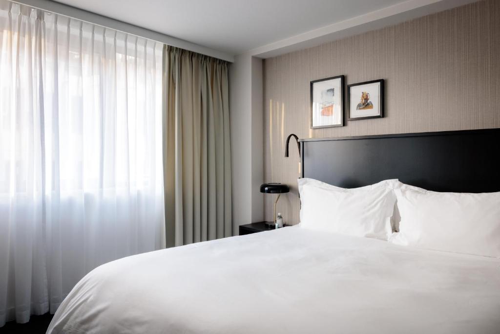 Postel nebo postele na pokoji v ubytování Pillows City Hotel Brussels Centre