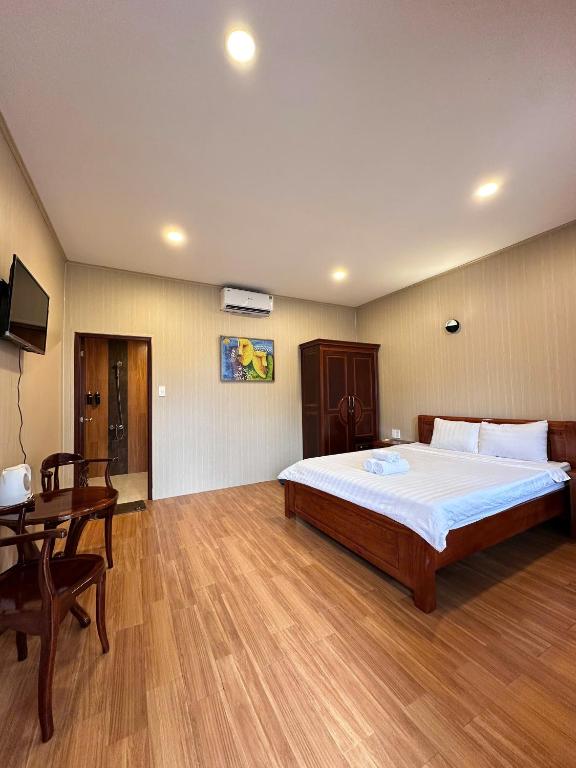 Postel nebo postele na pokoji v ubytování BUNGALOW HOTEL