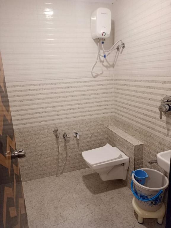 Koupelna v ubytování Hotel Karnavati